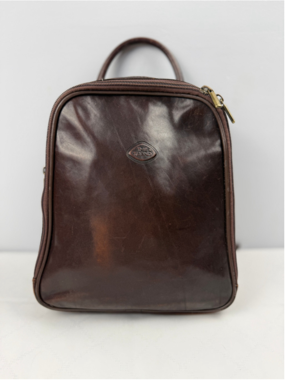 The Trend Leather Backpack Sling Bag Brown